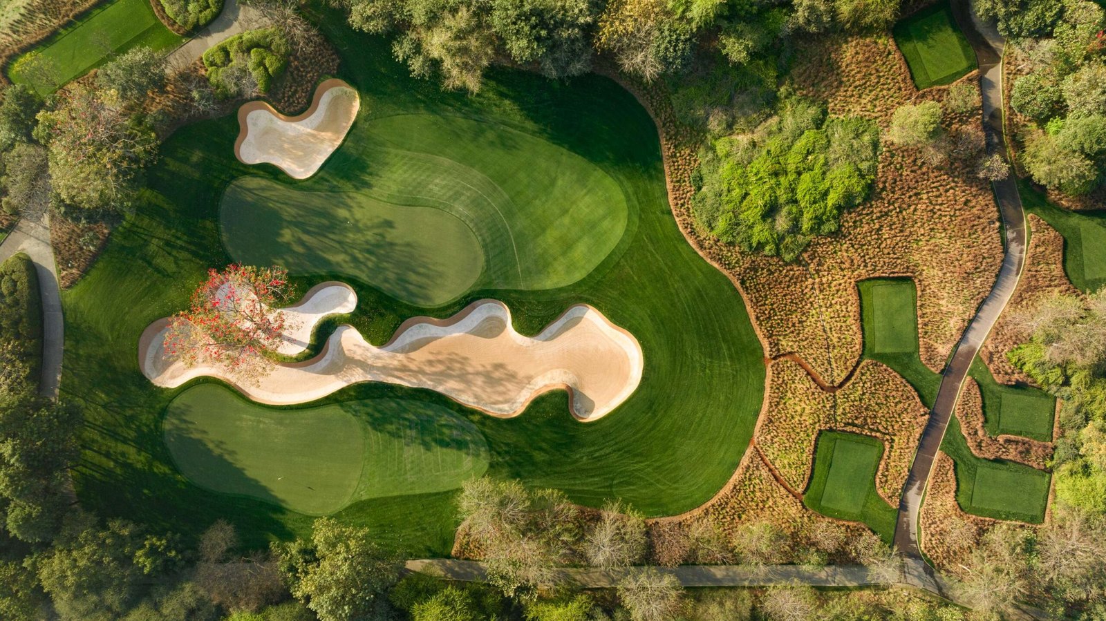Aerial view of the bunker complex at DLF Golf & Country Club, Gurugram, one of four stops in this guide to playing golf in India | Maree & Meridian