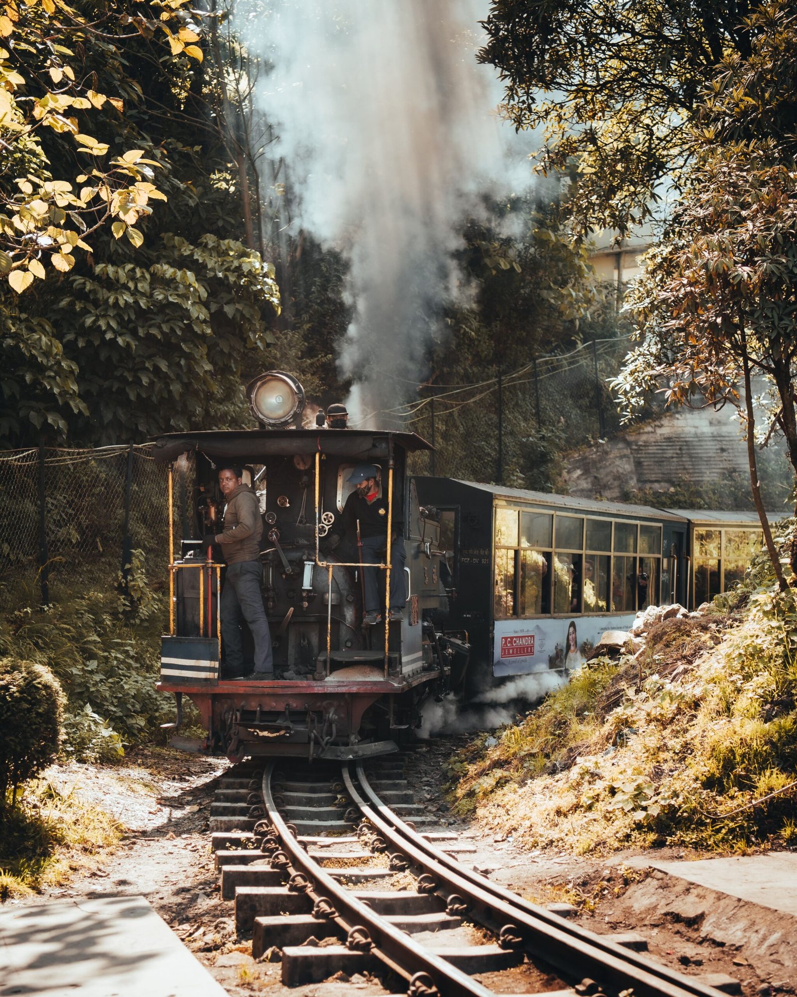 Driver watching from the cab of a Darjeeling Toy Train B class steam engine as it builds up steam
