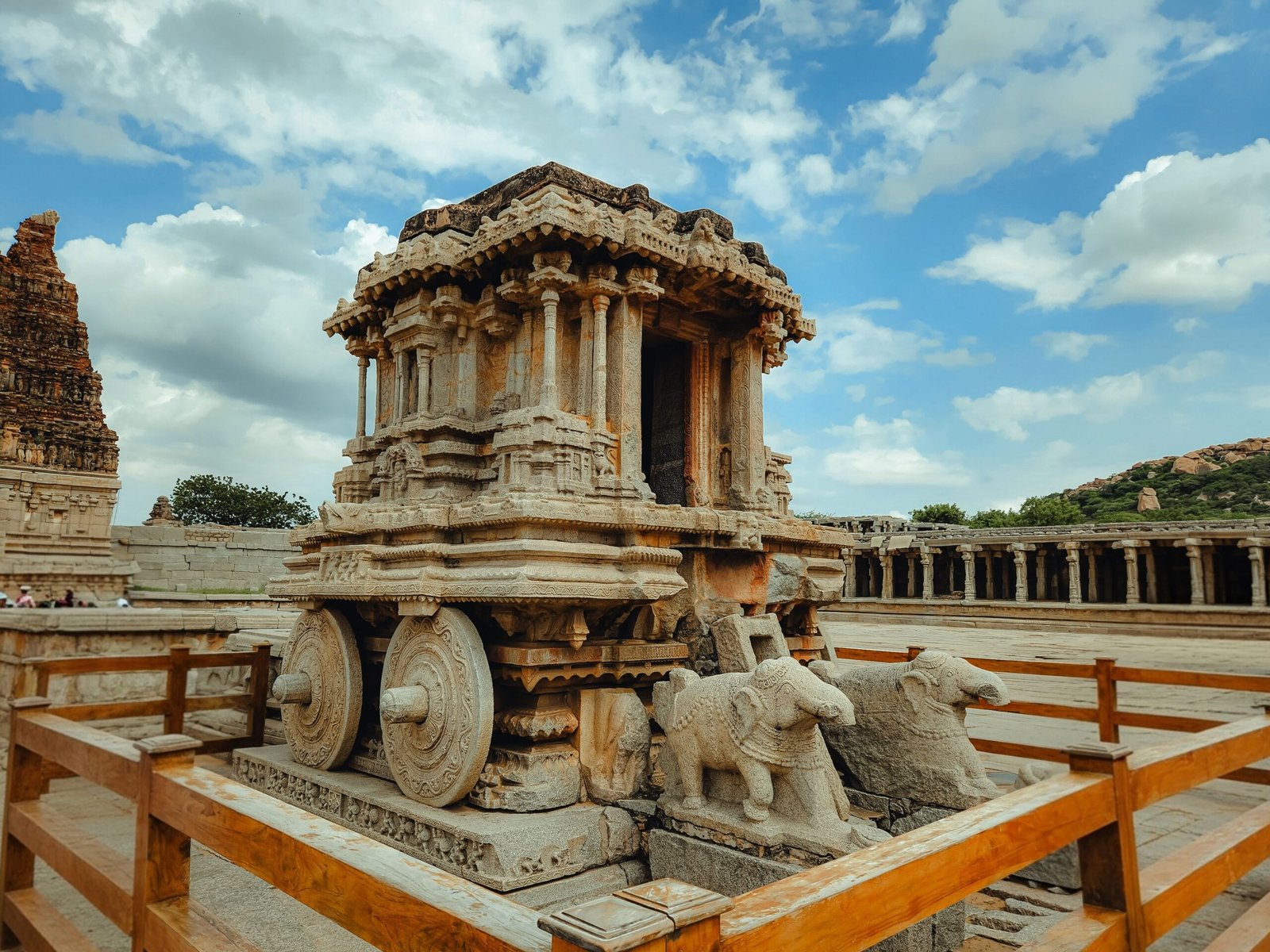 Granite stone chariot at the Vittala Temple in Hampi, a stop on the best train travel in India